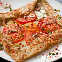 Tomato and anchovy galette